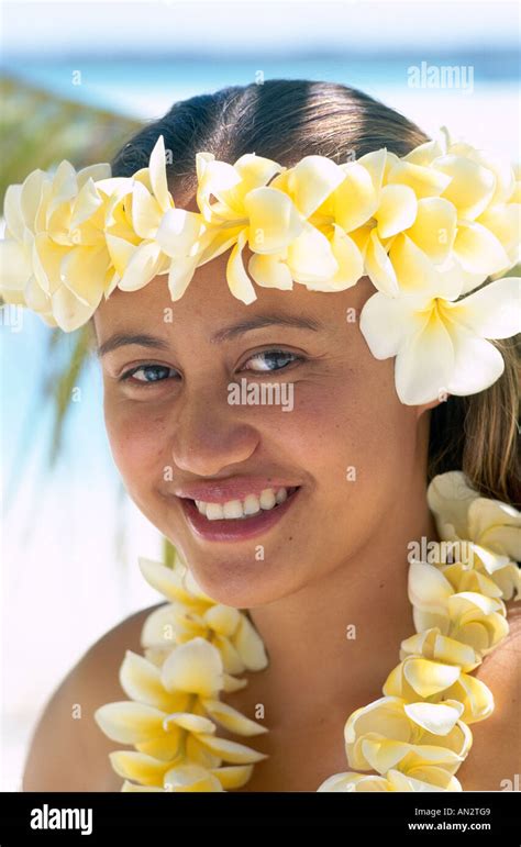 Polynesian Girl Dressed In Traditional Costume With Leis Flower