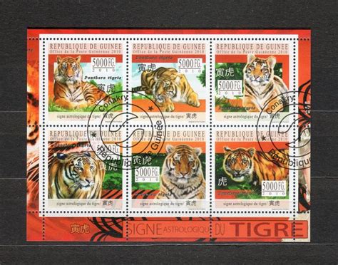 57 GUINEA CINSKY LUNARNY KALENDAR TIGER FAUNA Aukro