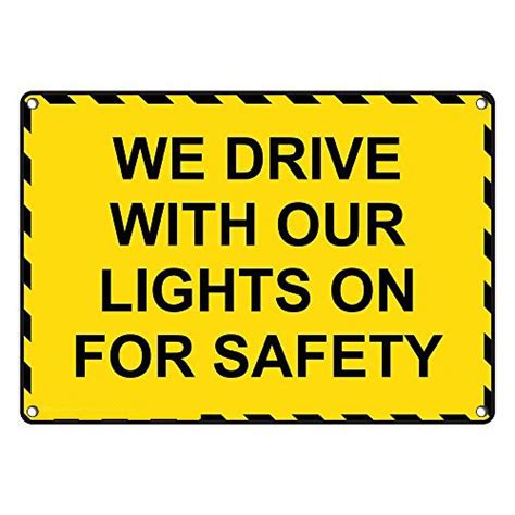 Weatherproof Plastic We Drive With Our Lights On For Safety Sign With English Text