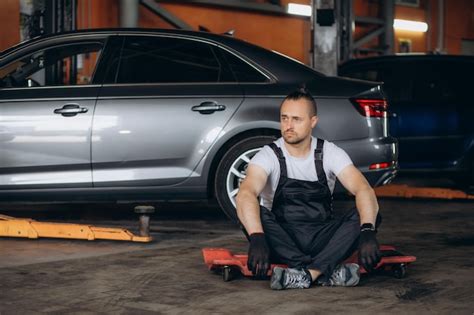 Premium Photo Tired Hot Wiping Sweat African Man Car Machanic Worker Working Hard At Auto Car