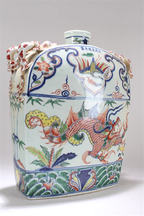 At Auction: A Chinese Duo-handled Detailed Massive Fortune Porcelain Vase