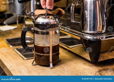 Barista Making Non Traditional Coffee In French Press Stock Photo