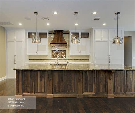 White Cabinets with a Walnut Kitchen Island - Omega