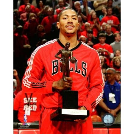 Derrick Rose poses with the 2010-11 NBA MVP Trophy Photo Print ...