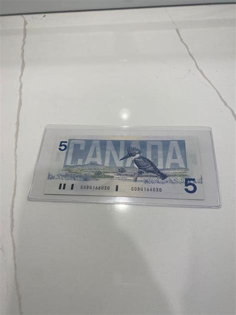 Guide to the unique security features of the canadian $2 bill 1986 13