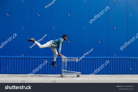 59582 Pushing Shopping Carts Images Stock Photos And Vectors Shutterstock