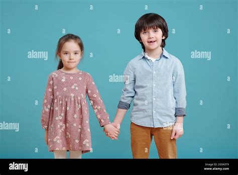 School Boy And Girl Holding Hands Hi Res Stock Photography And Images