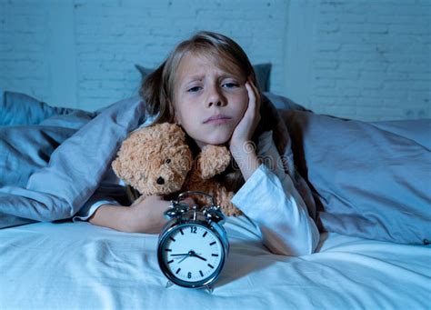 Beautiful Little Girl Feeling Sad And Tired Not Being Able To Sleep At