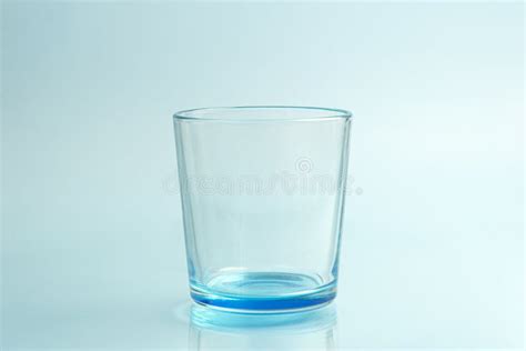 Clear Drinking Glass Isolated On Blue Background Stock Photo Image Of