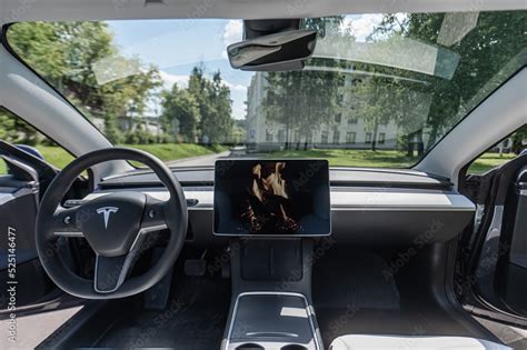 Salon from the inside of a Tesla electric car. Caring for the environment. Stock Photo | Adobe Stock