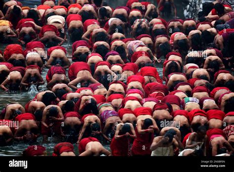 Nepalese Hindu Women Take Holy Bath In Bagmati River During Swasthani