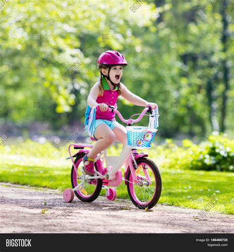 Child Riding Bike. Kid Image & Photo (Free Trial) | Bigstock