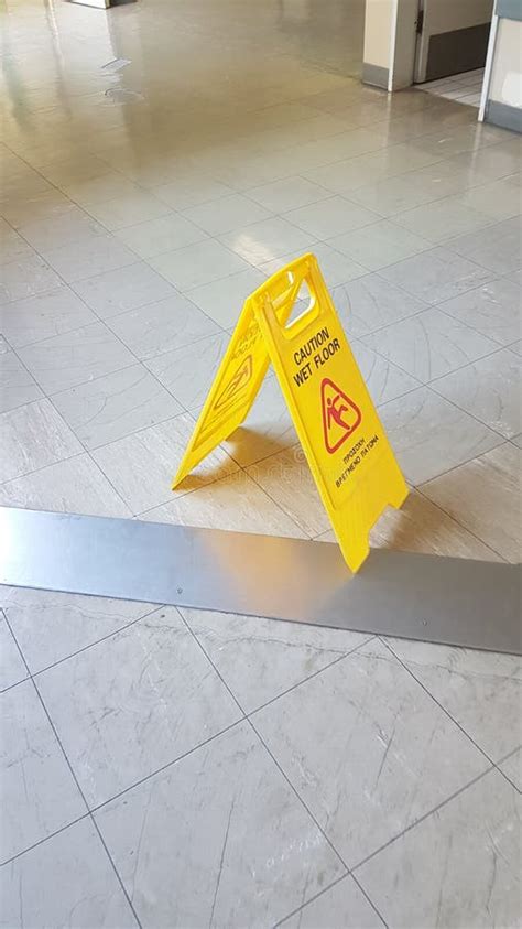 Wet Floor Sign Yellow Slippery Surface Stock Photo Image Of Greek