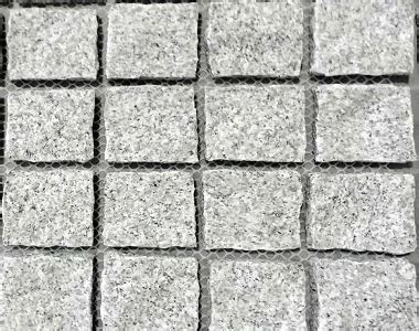 Grey Natural Split Tumbled Cobblestones On Mesh Sheet Stone Pavers