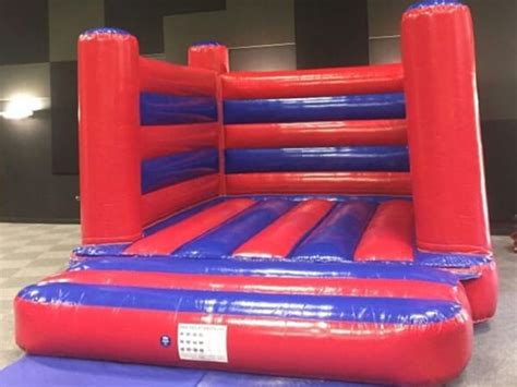 Adult Blue And Red Bouncy Castle Hire Cambridge And Stevenage