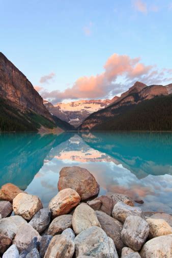 Lake Louise Sunrise Stock Photo - Download Image Now - Alberta, Banff National Park, Boulder ...