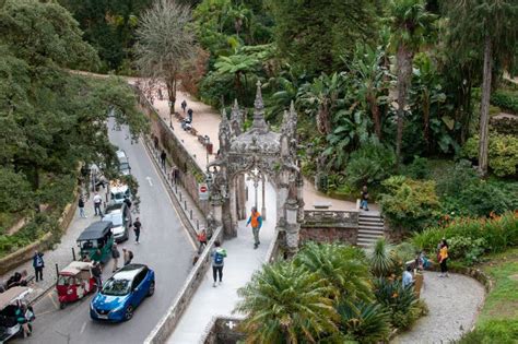 Tourists Visiting The Entrance Gate Of The Quinta Da Regaleira Sintra