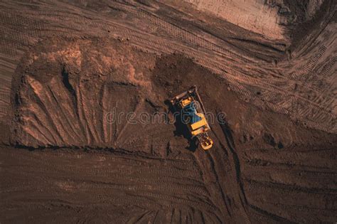 Yellow Tracked Bulldozer Performs Earthworks Aerial View Shot Stock