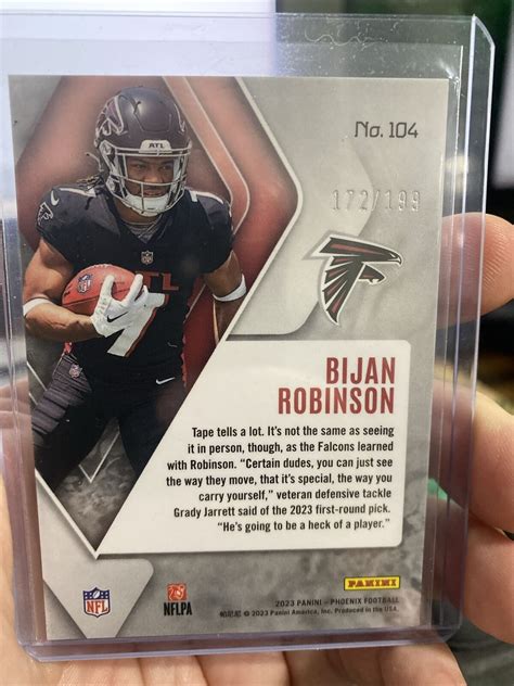 2023 Panini Phoenix Bijan Robinson Red Seismic 199 Rookie RC 104