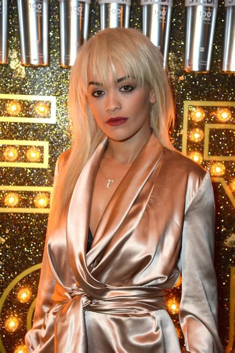 Rita Ora Looks Silky Smooth As She Flashes Her Underwear In A Satin