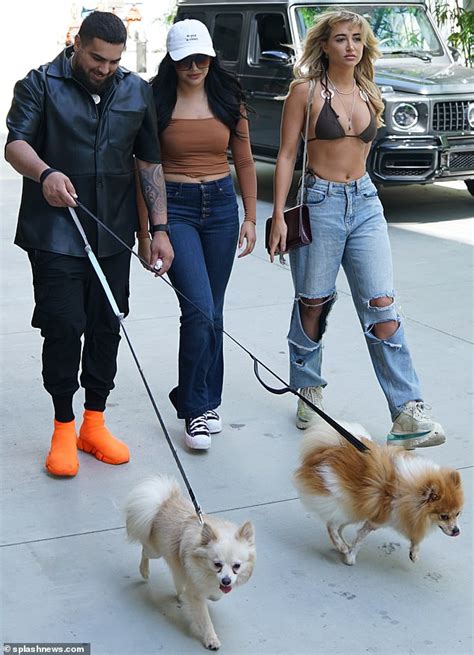 Georgia Harrison Parades Her Toned Abs In A Skimpy Bikini And Baggy Jeans While With Friends In