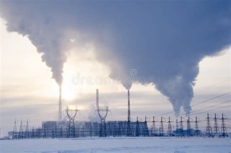 Gas Power Plant In Cold Winter Landscape During Sunset Stock Image