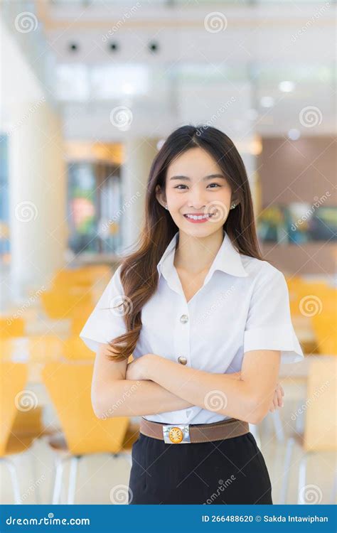 Portrait Of An Adult Thai Student In University Student Uniform Asian