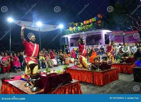 Nepalese Hindu Priests Performing Aarti Ceremony At The Lakeside