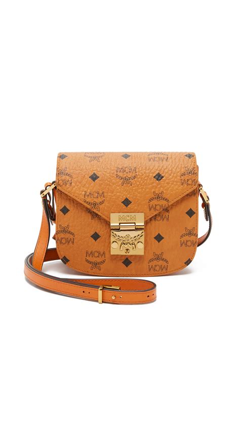 Lyst Mcm Mini Patricia Saddle Bag In Brown