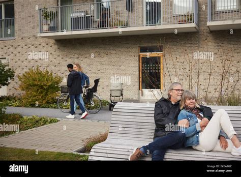 Mature Couple Relaxing On Bench Stock Photo Alamy