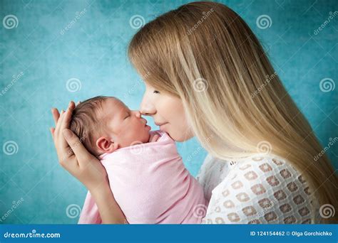 Portrait of Mother Hugging Her Newborn Baby Girl Stock Photo - Image of ...