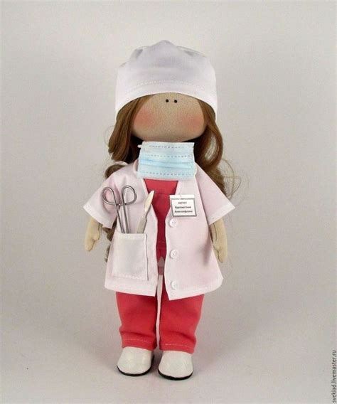 A Doll With A Doctor S Outfit And Scissors In Her Hand On A White