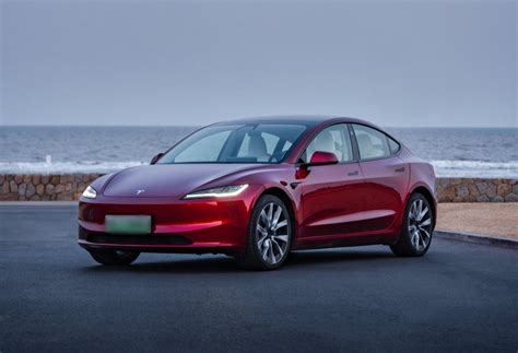 tesla-model-3-ultra-red-logo - TESLARATI