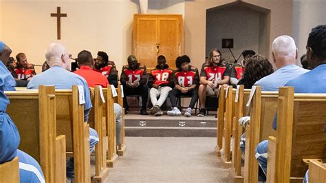 Players Visit Inmates, Talk Overcoming Adversity