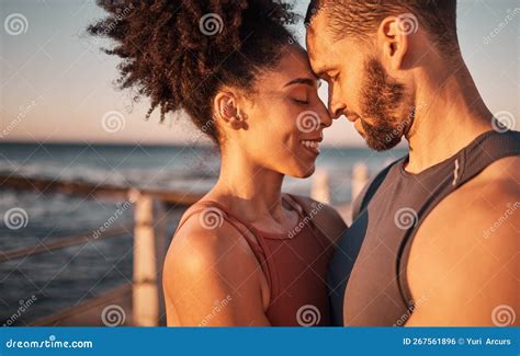 Black Couple Smile And Hug With Forehead By Beach Embracing