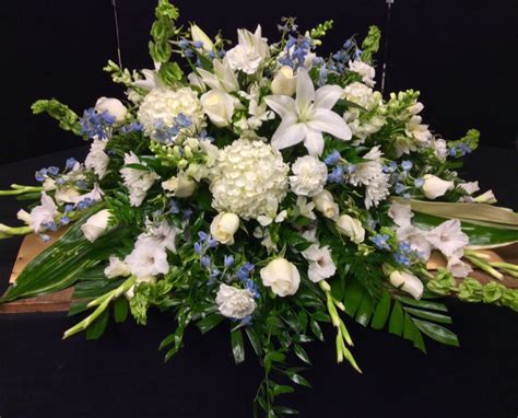 12 Couch Casket Spray In Blues And Whites Centerville Florists