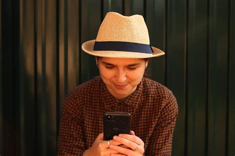 Premium Photo Young Woman With Phone Portrait Of Positive Cheerful