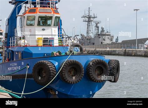 A Big Blue Tugboat In The Sea Designed To Push Pull And Tow Barges Or