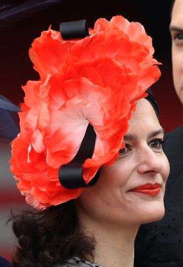 Fiery Red Fascinators Can Be Difficult To Pull Off Without Looking A