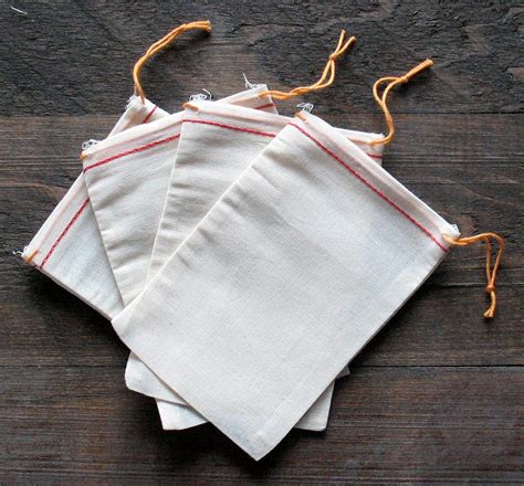 25 4x6 Inch Cotton Muslin Bags With Red Hem And By CelestialGifts