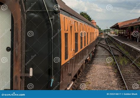 Restored Victorian Era Passenger Rail Train At A Train Station Stock