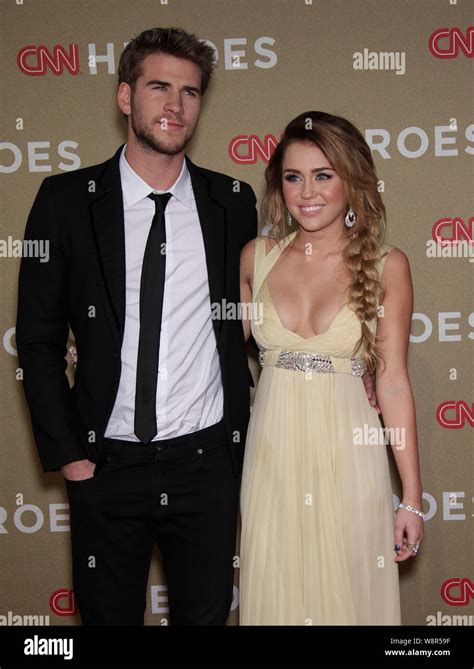 Miley cyrus liam hemsworth cnn heroes hi-res stock photography and ...