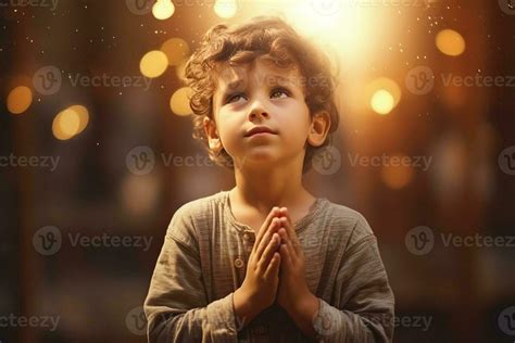 Cute Small Boy Praying In The Church And Jesus Giving Blessing