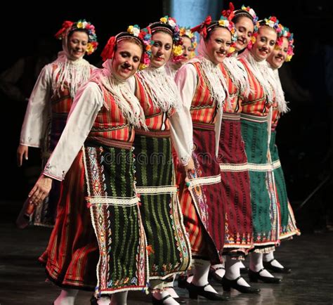 People in Traditional Folklore Costumes Perform Folk Dance Bulgarian ...