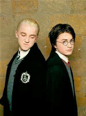 Two Harry Potters Standing Next To Each Other