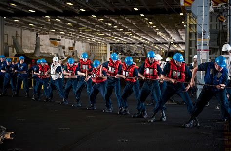 Sailors Heave A Line In The Hangar Bay Of The Aircraft Nara Dvids