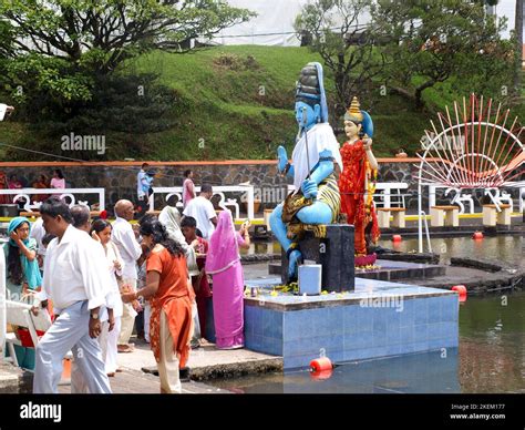 GRAND BASSIN MAURITIUS FEBRUARY 24 2011 Pilgrims Pray Before The