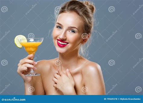 Sexy Blonde Naked Woman Enjoying Her Vacation In Hot Tub Bubbling Water In Summer Sun Stock