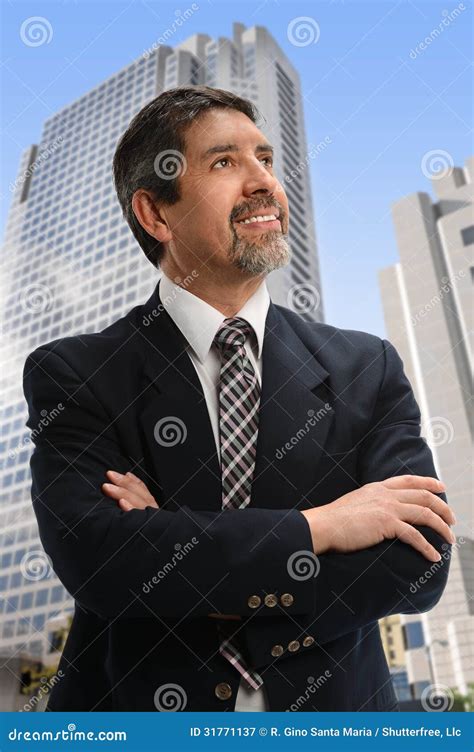 Hispanic Businessman Looking Up Stock Image Image Of Corporate