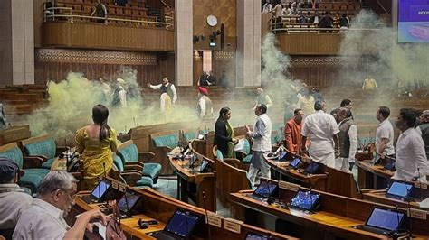 Lok Sabha Security Breach Two People Jump In Chamber Spray Yellow Gas